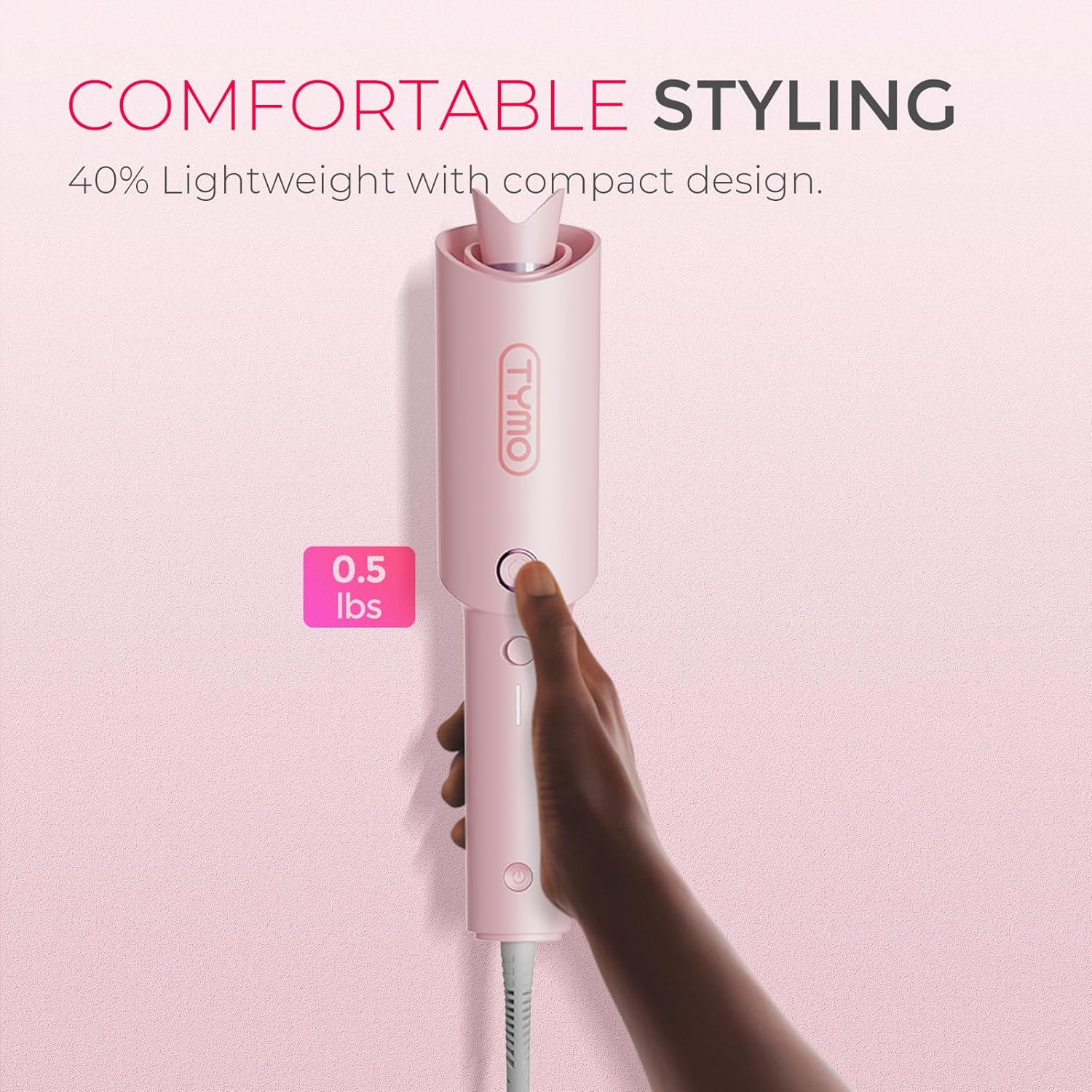 Automatic rotating curling wand in pink with ceramic coating, shown creating beach waves hairstyle — view 3