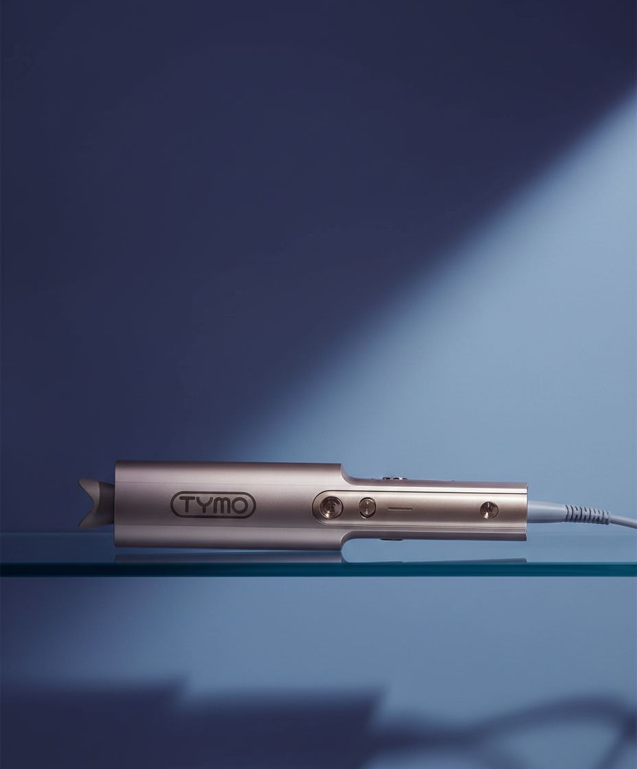 Gold ionic ceramic rotating curling iron with 1-inch barrel for long hair styling — view 3