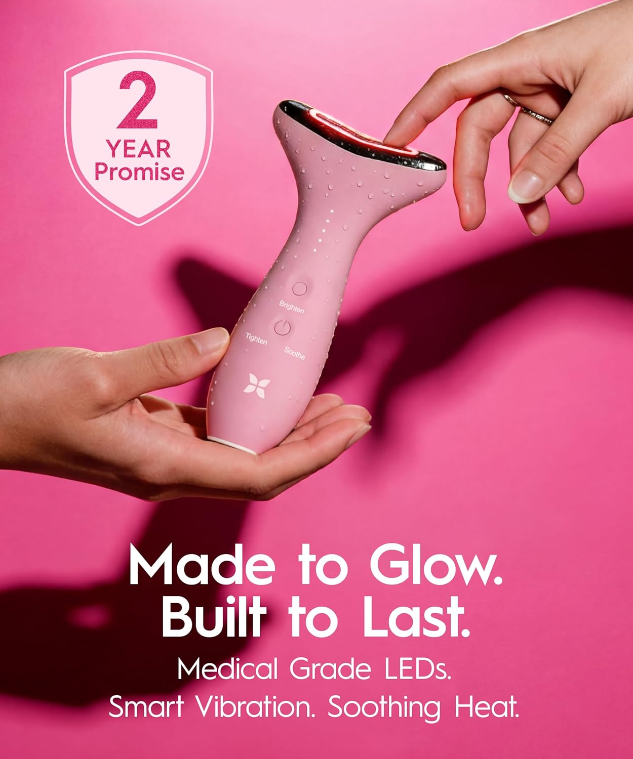 LED facial massager with red, blue, and green light modes for face and neck depuffing, shown in neutral finish — view 4