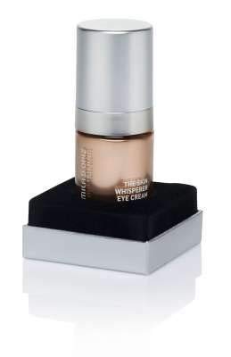 Luxury apothecary-style eye cream in neutral packaging, targeted for dark circles and under-eye puffiness — view 2